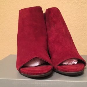 Beautiful garnet peeptoe size 6.  Worn only to try on NIB. Very comfortable!